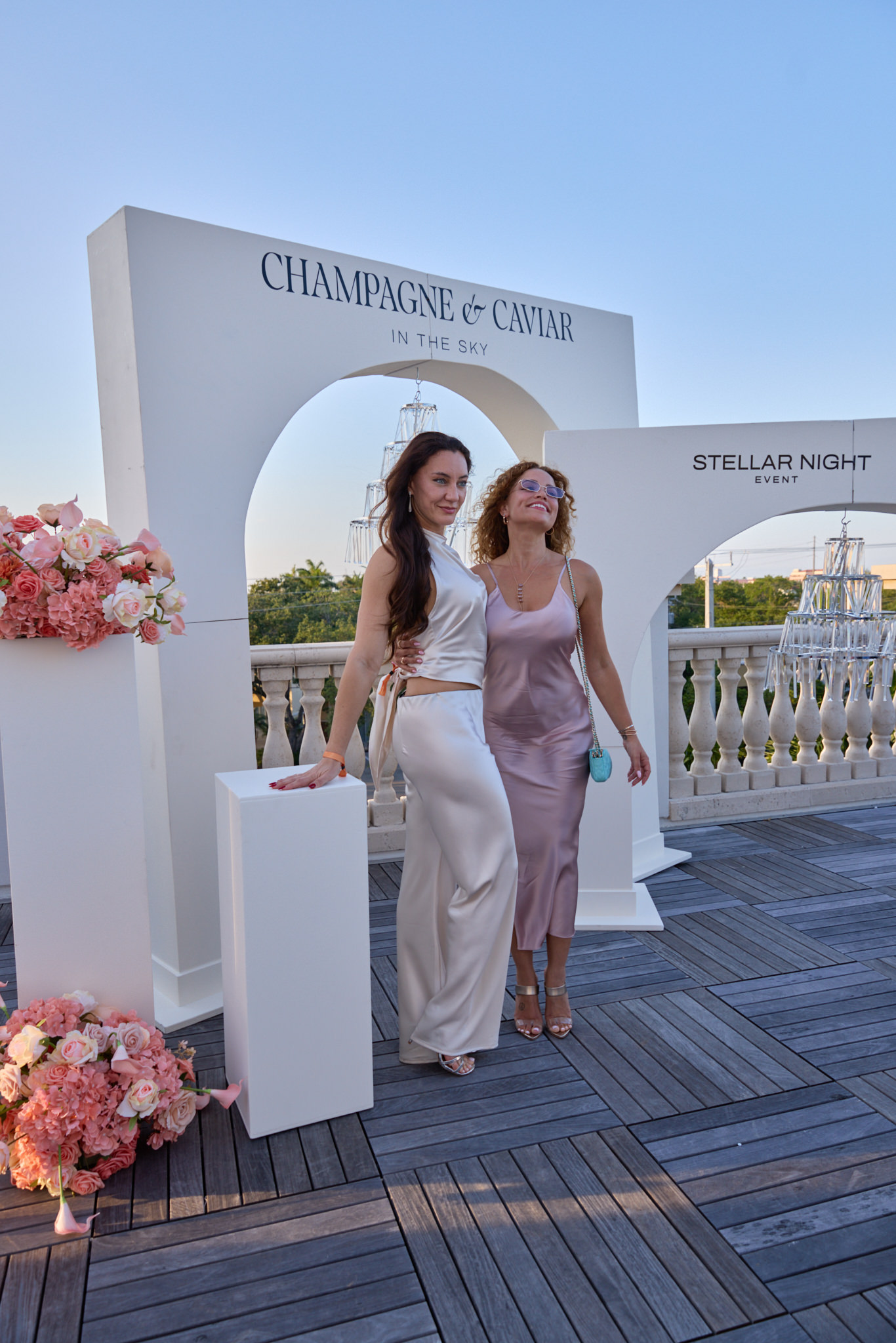 Two guests enjoying the Champagne and Caviar rooftop experience